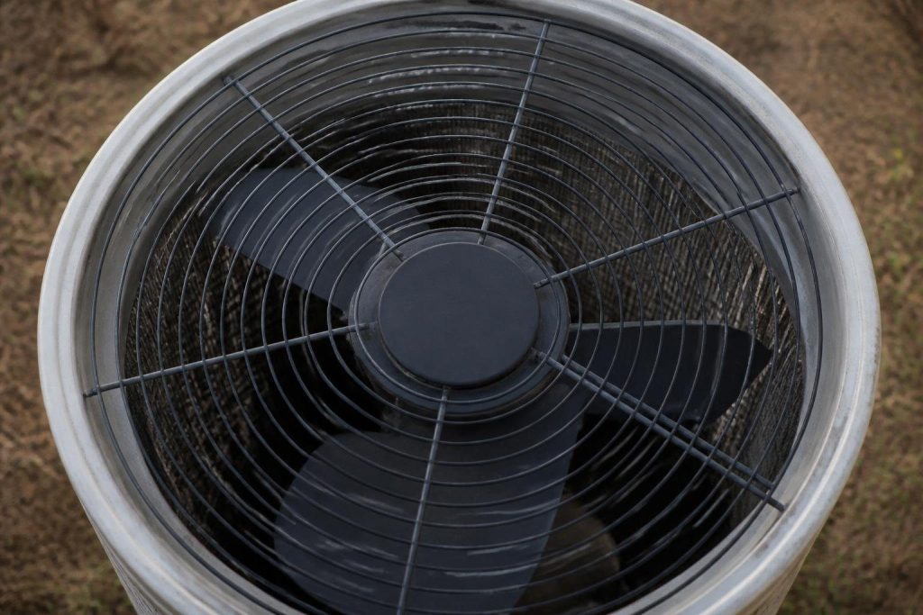 A condenser fan stopped while the system calls for cooling.