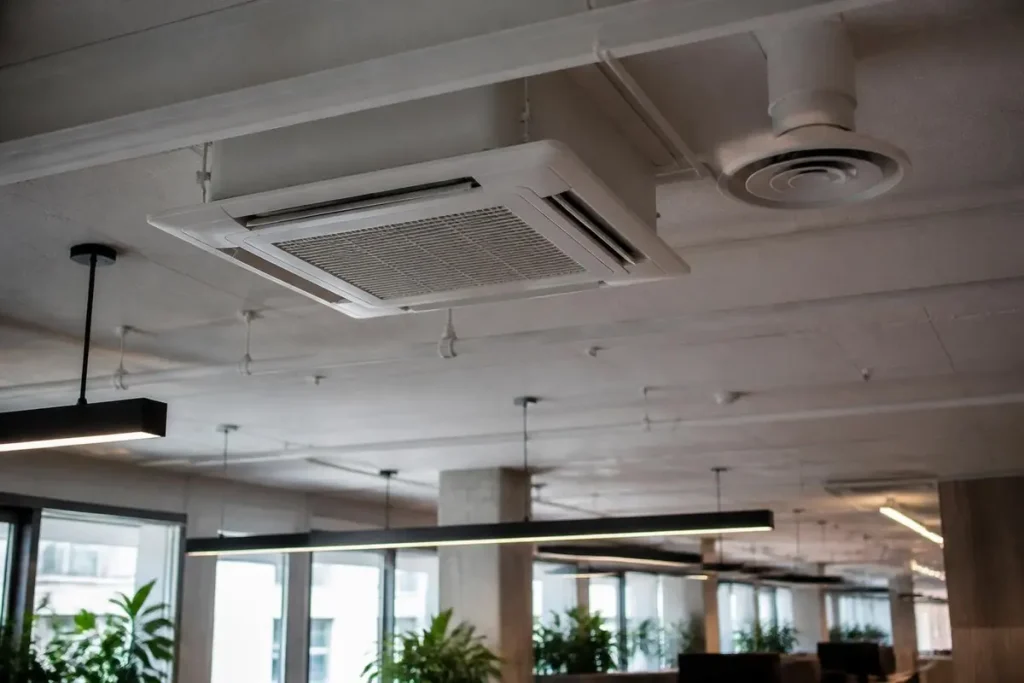 A DOAS delivers the fresh air; a separate terminal system like VRF handles the room's heating and cooling.
